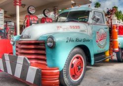 vintage chevrolet tow truck in a gas station hdr