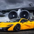 yellow mclaren p1 in an old airport hdr