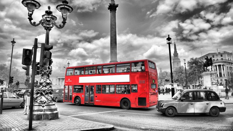red london bus in black and white