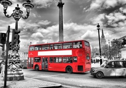 red london bus in black and white