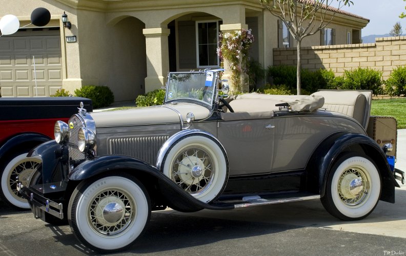 1931_ford_model_a_beige_with_the_top_down.jpg