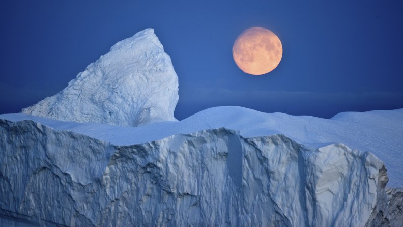 moon over iceberg