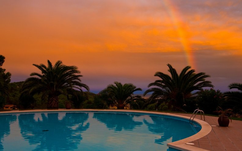 Rainbow and Sunset over Pool