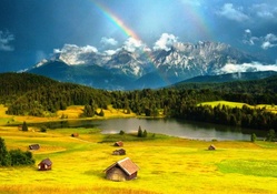 Rainbow At The Alps