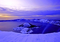 blue dawn on crater lake in winter