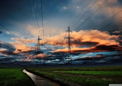 lovely sunset sky above electric lines