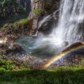 wonderful rainbow at the bottom if a waterfall hdr