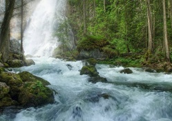 splendid waterfall into a ranging rive