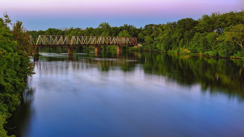 bridge over a calm river 