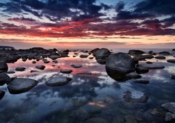 wonderful rocky seashore at sunset