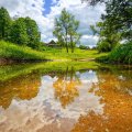 beautiful clear stream by a village hdr