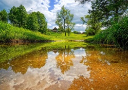 beautiful clear stream by a village hdr