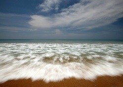 Waves rushing onto Beach