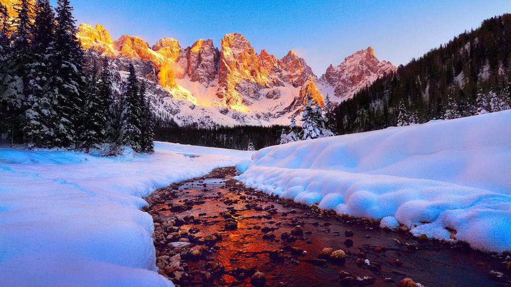 stream in the golden dolomite mountains
