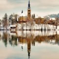 church on a lake island in winter