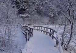 snowdrifts on a bridge in winter