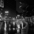 rainy night on a cobblestone street