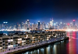 view of nyc at night from weehawken nj