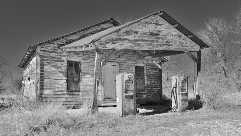 derelict texas gas station in grayscale
