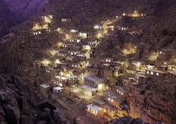 ancient village on a cliff in evening