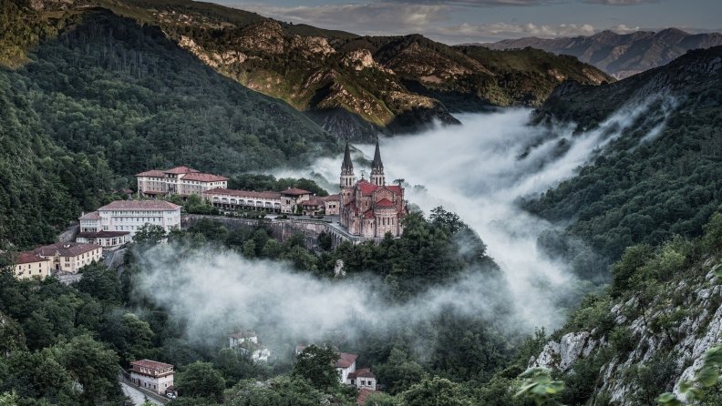 monastery_on_a_hill_in_a_foggy_valley.jpg