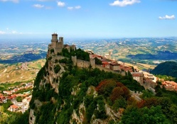 castle atop a mountain village