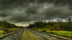 straight rail tracks to the horizon hdr
