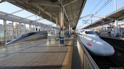 high speed trains in a station in japan