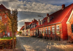 red brick houses on a cobblestone street hdr