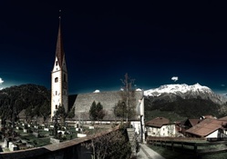 church and cemetery in an alpine town