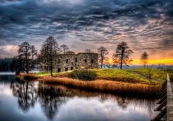 stone fort on an island at sunset hdr