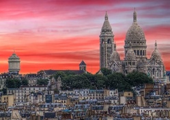 cathedral on a hill in paris at sunset