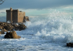 castle ruins in a wild sea shore