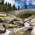 wonderful stone bridge over mountain stream