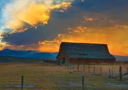 glorious sunset over old barn