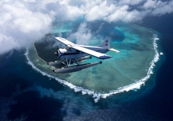 airplane over island 