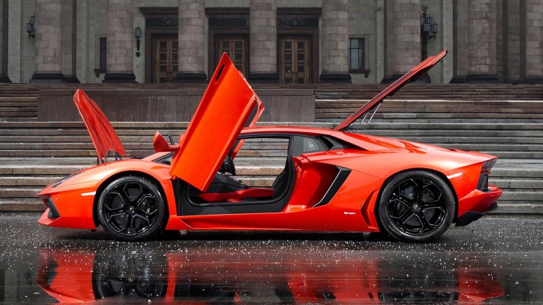red_lamborghini_with_everythin_open_in_hail.jpg