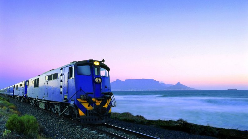 train_leaving_table_mountain_south_africa.jpg