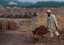 Man From Pakistan making Stones