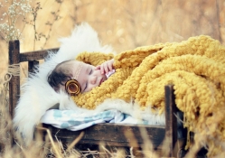Baby girl sleeping in nature