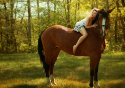Girl on a Brown Horse