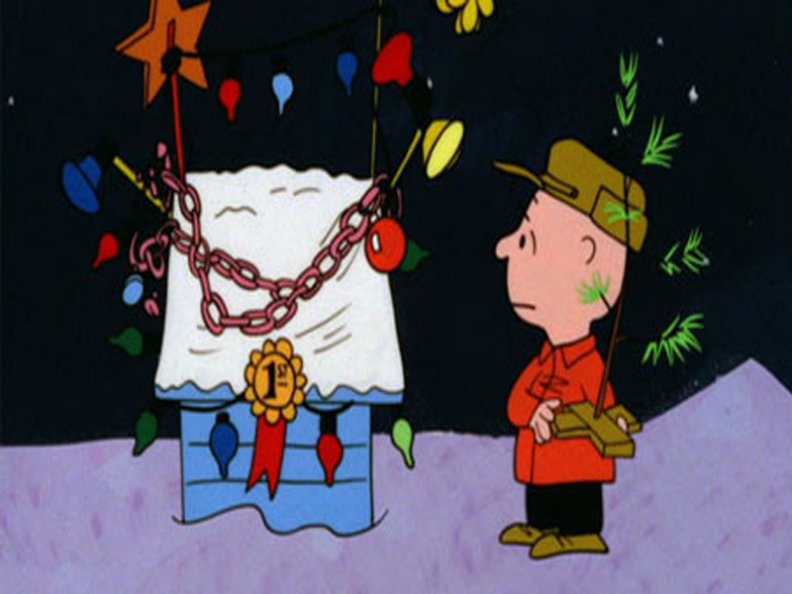 charlie brown with chained doghouse
