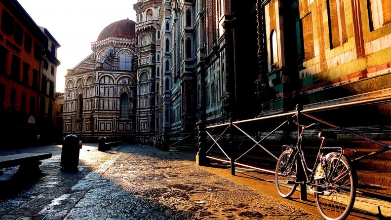 bicycle on a florence street at sunrise
