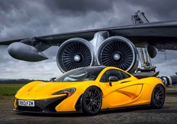 yellow mclaren p1 in an old airport hdr