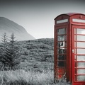 red phone booth in the middle of nowhere