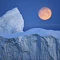 moon over iceberg