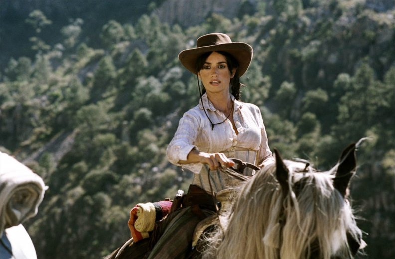 gorgeous_cowgirl_on_horse.jpg