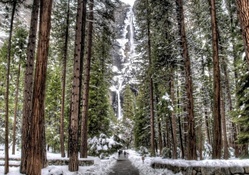 tall waterfalls in forest at winter hdr