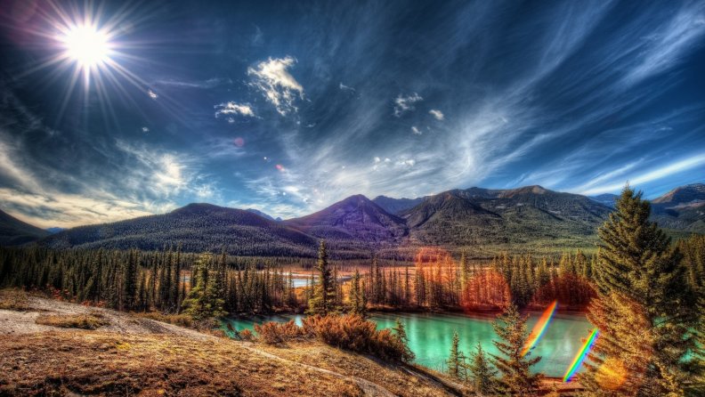 sun rays over amazing natural landscape hdr