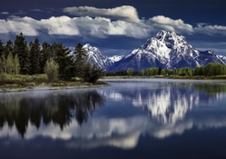 mount moran above snake river in the grand tetons